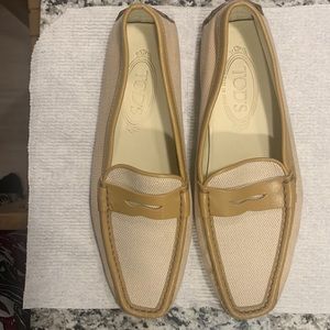 Beautiful Tod’s loafers in two tone canvas and leather.